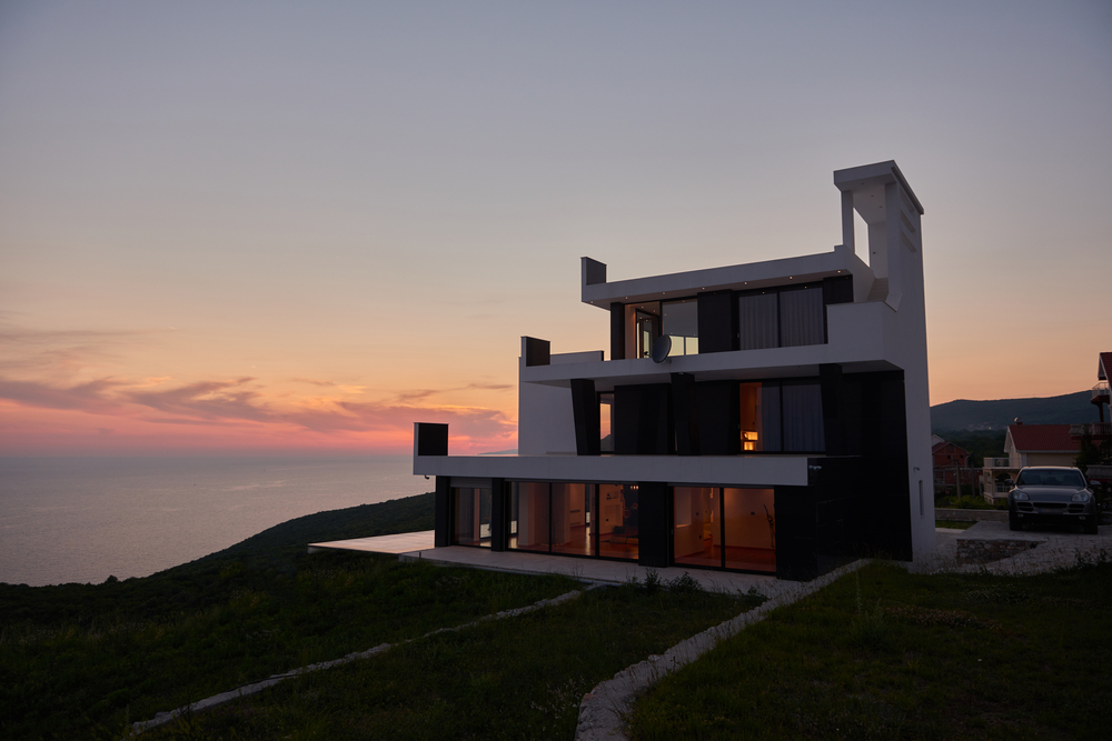 External view of a contemporary house modern villa at  sunset